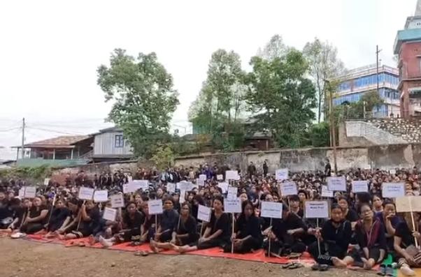 Large gathering of women protestors seated during a demonstration in Moreh, Manipur.