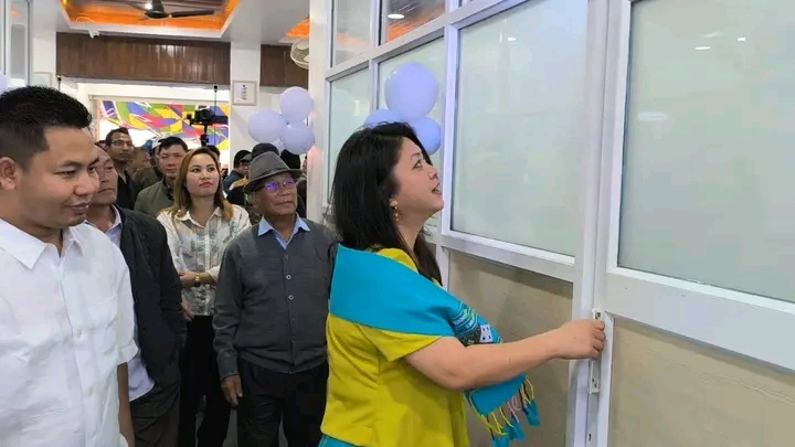 Opening ceremony of a new medical facility attended by officials and community members.
