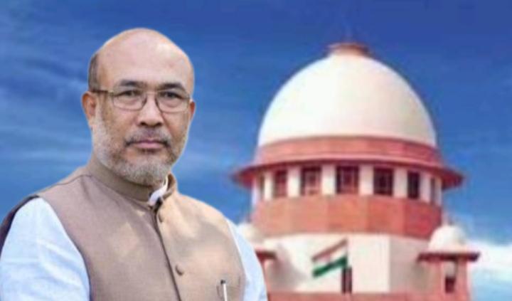 Portrait of N. Biren Singh with the Supreme Court building in the background.