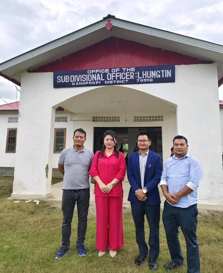 Group of officials standing in front of SDO Office Lhungtin building.