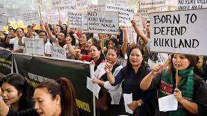 protest crowd holding placards,