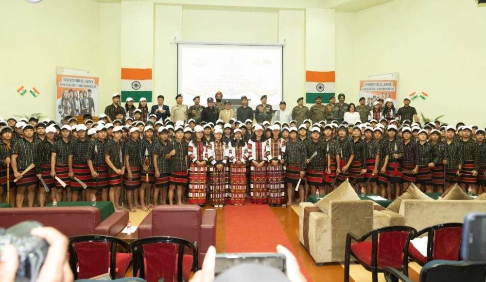 Mizo Territorial Army recruits posing with Mizoram officials during the flag-off event