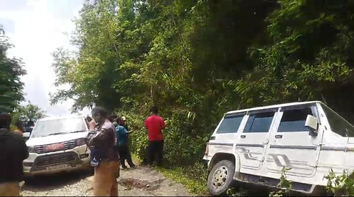 Church Leaders Ambushed in Kangpokpi; Former MBC General Secretary Among 3 Killed, 4 Injured Vehicles parked near roadside vegetation after a reported ambush attack