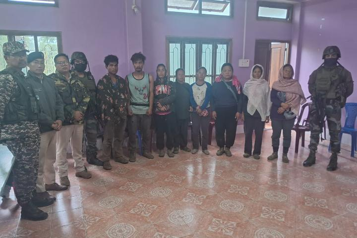 KCLF Demands Hostage Release, Impartial Probe Into Killing of 3 Church Leaders Security personnel and civilians gathered indoors following hostage release efforts in Manipur