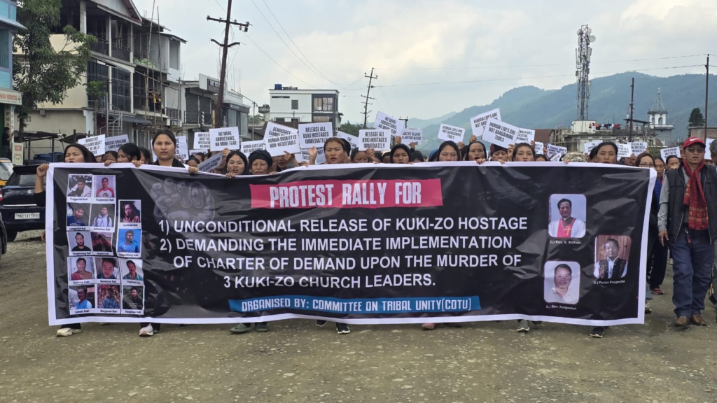 Kuki protesters carrying banners during a shutdown rally in Kangpokpi district