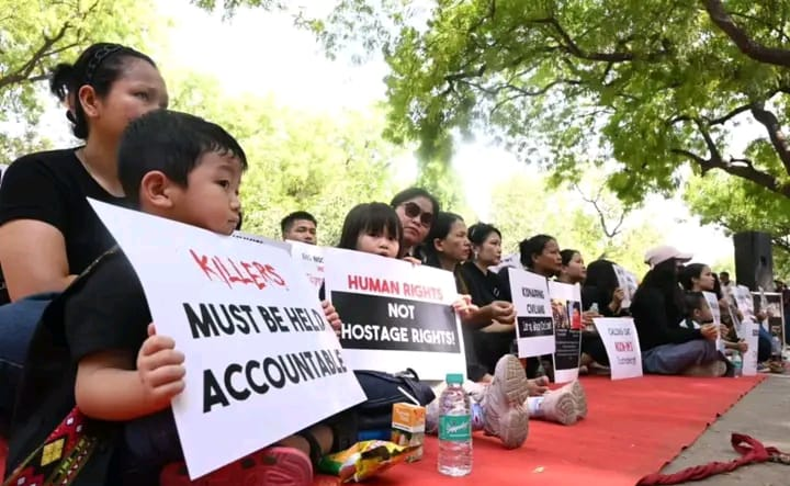 Protesters holding placards at Jantar Mantar during KSO Delhi demonstration over Kuki pastors killings